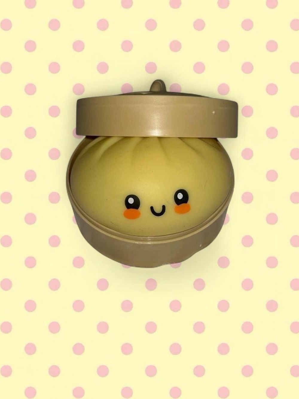 yellow squishy dumpling toy (gel)